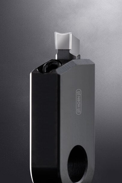 Système d'outillage diamant pour l'usinage de précision des bagues