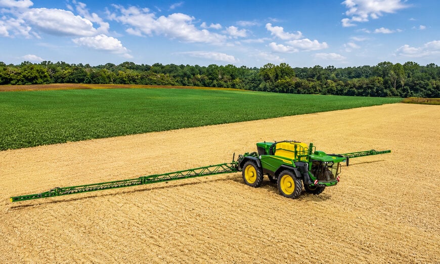 Tank capacity upgrade and active boom stabilization for self-propelled sprayers